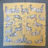 A wonderful second hand scarf from Hermes featuring deer, by de Poret, brought to you by UK based HermesScarf.co.uk